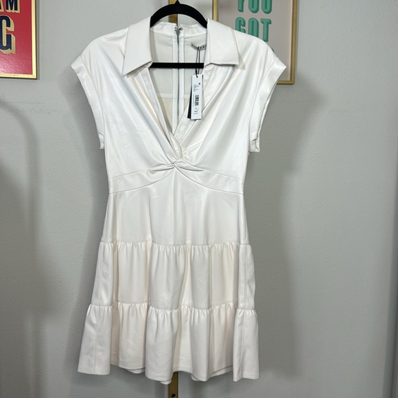 Alice and Olivia
Mila Faux Leather Twist Front Cap Sleeve Dress - Picture 6 of 10